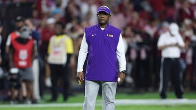 Interim head coach Frank Wilson of the LSU Tigers looks on during warmups prior to facing the Alabama Crimson Tide (Getty Images via AFP) Interim head coach Frank Wilson of the LSU Tigers looks on during warmups prior to facing the Alabama Crimson Tide (Getty Images via AFP)