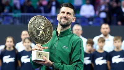 Novak Djokovic of Serbia raises the trophy of the ATP 250 tennis tournament after winning the final match against Lorenzo Musetti of Italy, in Athens (AP) Novak Djokovic of Serbia raises the trophy of the ATP 250 tennis tournament after winning the final match against Lorenzo Musetti of Italy, in Athens (AP)