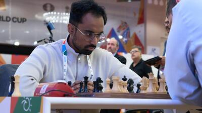 India’s Karthik Venkataraman during his third round game in the Chess World Cup in Goa on Sunday. (FIDE) India’s Karthik Venkataraman during his third round game in the Chess World Cup in Goa on Sunday. (FIDE)