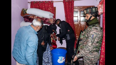 J&K Police personnel with a CRPF team conducting searches in Srinagar on Sunday. (ANI) J&K Police personnel with a CRPF team conducting searches in Srinagar on Sunday. (ANI)