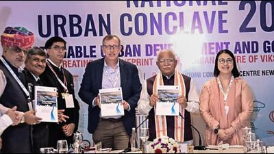 Minister Khattar (second from right) also launched the PM e-Bus Service logo and announced Bhubaneswar as host city for the 19th Urban Mobility India conference in 2026. (@mlkhattar) Minister Khattar (second from right) also launched the PM e-Bus Service logo and announced Bhubaneswar as host city for the 19th Urban Mobility India conference in 2026. (@mlkhattar)