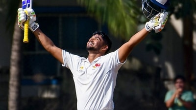Musheer Khan celebrates his century during the first day of the Ranji Trophy 2025-26 cricket match. (PTI) Musheer Khan celebrates his century during the first day of the Ranji Trophy 2025-26 cricket match. (PTI)
