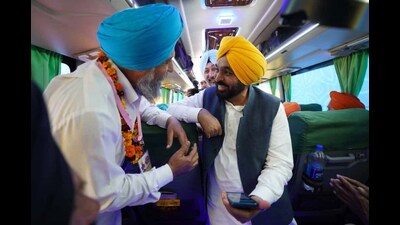 Punjab CM Bhagwant Mann during the flagging off ceremony of the first batch of devotees under the 'Mukh Mantri Tirath Yatra Scheme', at Bardwal village in Sangrur. (Sourced)