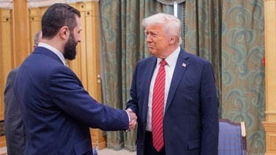 US President Donald Trump with Syria's interim President Ahmad al-Sharaa. (AP File Photo) US President Donald Trump with Syria's interim President Ahmad al-Sharaa. (AP File Photo)