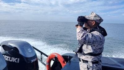 The status of the other two boats was not known, and a search-and-rescue operation was ongoing. (Reuters)