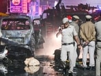 Delhi Police, Fire Brigade, and other agencies investigate the site where a blast occurred near Chandni Chowk Metro Station, in New Delhi, on Monday. Delhi Police, Fire Brigade, and other agencies investigate the site where a blast occurred near Chandni Chowk Metro Station, in New Delhi, on Monday.