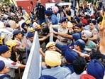 Chandigarh SSP Kanwardeep Kaur trying to pacify the protesters at Panjab University on Monday. (Keshav Singh/HT) Chandigarh SSP Kanwardeep Kaur trying to pacify the protesters at Panjab University on Monday. (Keshav Singh/HT)
