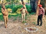 One of the accused was nabbed after a brief exchange of fire near Bhukri road, Kharar, on Monday (HT Photo)