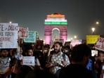 Protesters hold placards in front of India Gate during a protest against air pollution in New Delhi on Sunday. (Reuters) Protesters hold placards in front of India Gate during a protest against air pollution in New Delhi on Sunday. (Reuters)