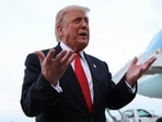U.S. President Donald Trump speaks to reporters upon his return to Washington at Joint Base Andrews in Maryland, U.S., November 9, 2025.  REUTERS/Kevin Lamarque