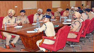 A meeting of senior police officers from different districts in Ludhiana on Monday. (HT Photo) A meeting of senior police officers from different districts in Ludhiana on Monday. (HT Photo)