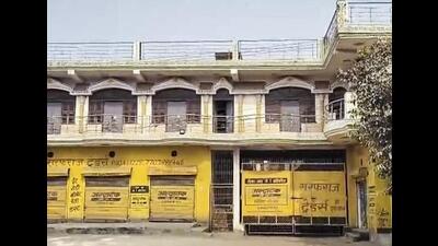 A room in this lodge was rented by Muzammil Shakeel, a Kashmiri doctor and a teacher at Al Falaha University, from where 360 kg of explosives, suspected to be ammonium nitrate, and a cache of arms and ammunition were recovered in a joint operation by Jammu and Kashmir Police and Haryana Police in Faridabad on Monday. (PTI Photo) A room in this lodge was rented by Muzammil Shakeel, a Kashmiri doctor and a teacher at Al Falaha University, from where 360 kg of explosives, suspected to be ammonium nitrate, and a cache of arms and ammunition were recovered in a joint operation by Jammu and Kashmir Police and Haryana Police in Faridabad on Monday. (PTI Photo)