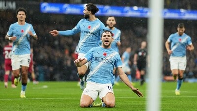 Nico Gonzalez, centre, celebrates after scoring his side's second goal during the English Premier League soccer match between Manchester City and Liverpool (AP) Nico Gonzalez, centre, celebrates after scoring his side's second goal during the English Premier League soccer match between Manchester City and Liverpool (AP)