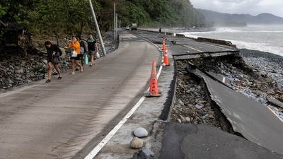 Landslides also isolated at least four towns in the province of Aurora, where Fung-wong made landfall. (Reuters)