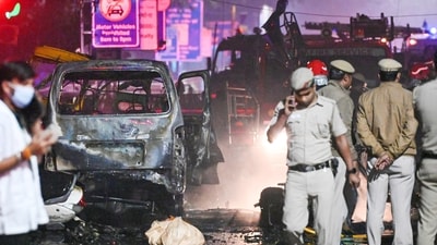Delhi Police, Fire Brigade, and other agencies investigate the site where a blast occurred near Chandni Chowk Metro Station, in New Delhi, on Monday. (Sanjeev Verma/ Hindustan Times) Delhi Police, Fire Brigade, and other agencies investigate the site where a blast occurred near Chandni Chowk Metro Station, in New Delhi, on Monday. (Sanjeev Verma/ Hindustan Times)