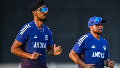 India's Arshdeep Singh (L) and Kuldeep Yadav attend a practice session. (AFP) India's Arshdeep Singh (L) and Kuldeep Yadav attend a practice session. (AFP)