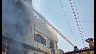 Four members of family, including two-year-old girl, died after fire swept through ground-plus-three-storey building in Vita town, Sangli district, on Monday morning. (HT)