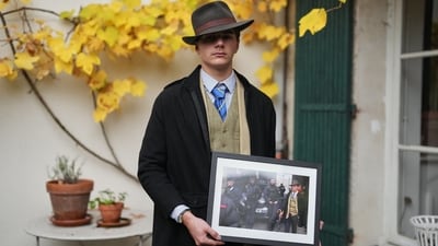 Pedro Elias Garzon Delvaux poses with an Associated Press photo of him outside the Louvre on the day of the crown jewels heist (AP) Pedro Elias Garzon Delvaux poses with an Associated Press photo of him outside the Louvre on the day of the crown jewels heist (AP)
