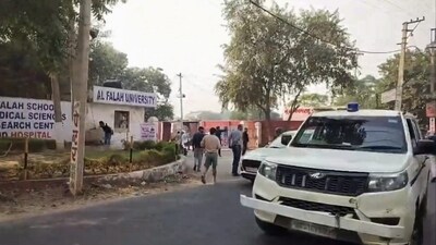 Police vehicle at the site after 350 kg of RDX and an AK-47 rifle were recovered, in Faridabad, Monday. (PTI) Police vehicle at the site after 350 kg of RDX and an AK-47 rifle were recovered, in Faridabad, Monday. (PTI)