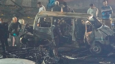Officers from various security agencies investigate the spot after a blast occurred in a car near Red Fort, leaving multiple vehicles in flames, in New Delhi, Monday. (PTI) Officers from various security agencies investigate the spot after a blast occurred in a car near Red Fort, leaving multiple vehicles in flames, in New Delhi, Monday. (PTI)