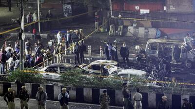 Police officers and forensic technicians work at the site of the blast near Red Fort on Monday. (REUTERS) Police officers and forensic technicians work at the site of the blast near Red Fort on Monday. (REUTERS)