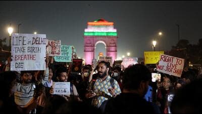 Protesters hold placards in front of India Gate during a protest against air pollution in New Delhi on Sunday. (Reuters) Protesters hold placards in front of India Gate during a protest against air pollution in New Delhi on Sunday. (Reuters)