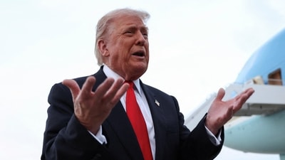 President Trump suggests $2,000 payments for Americans funded by tariff income, aiming to alleviate national debt with excess funds. His announcement has drawn criticism and questions regarding the timing and fairness of these proposed payments amid ongoing economic concerns. (REUTERS)
