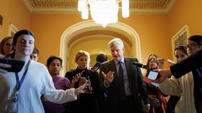 Senator Bill Cassidy speaks to reporters along the Ohio Clock Corridor on November 10 on Capitol Hill in Washington, DC. (Getty Images via AFP) Senator Bill Cassidy speaks to reporters along the Ohio Clock Corridor on November 10 on Capitol Hill in Washington, DC. (Getty Images via AFP)