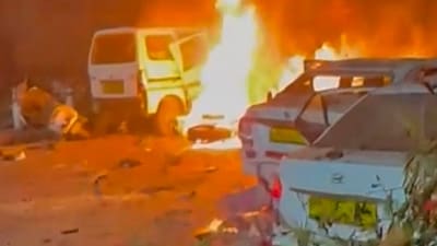Flames rise after a blast occurred in a parked car near Red Fort, leaving multiple vehicles in flames, in New Delhi (PTI) Flames rise after a blast occurred in a parked car near Red Fort, leaving multiple vehicles in flames, in New Delhi (PTI)