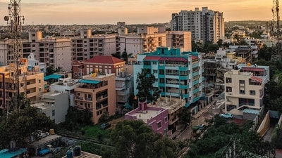 With property prices climbing, many NRIs say homes in Indian metros now cost as much as those abroad, with some claiming better value and returns in countries like Australia and Germany. (Representational Image) (Unsplash ) With property prices climbing, many NRIs say homes in Indian metros now cost as much as those abroad, with some claiming better value and returns in countries like Australia and Germany. (Representational Image) (Unsplash )