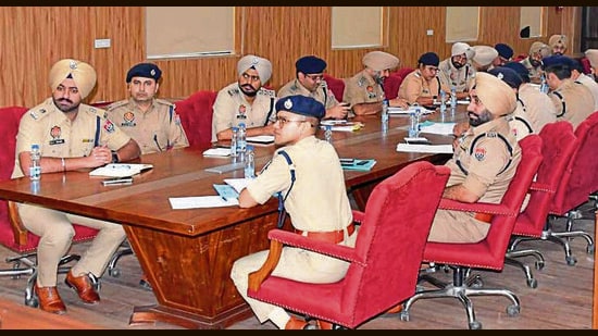 A meeting of senior police officers from different districts in Ludhiana on Monday. (HT Photo)
