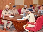 A meeting of senior police officers from different districts in Ludhiana on Monday. (HT Photo)