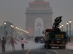Anti-smog gun spraying water to curb the air pollution at India Gate, in New Delhi on Monday. Anti-smog gun spraying water to curb the air pollution at India Gate, in New Delhi on Monday.