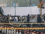 Charred remains of vehicles at the site of the blast on Monday near Red Fort Metro Station in Delhi. (PTI)