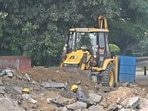 Demolition activity near Oberoi flyover, which also helps in dust pollution. (Sanjeev Verma/HT Photo)