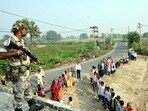 A security personnel stands guard at a polling station during the second and final phase of the Bihar Assembly elections. (Photo for representation) A security personnel stands guard at a polling station during the second and final phase of the Bihar Assembly elections. (Photo for representation)