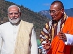 Prime Minister Narendra Modi welcomed by Bhutan's Prime Minister Tshering Tobgay on his arrival in Thimphu on Tuesday. (DPR PMO/ via ANI) Prime Minister Narendra Modi welcomed by Bhutan's Prime Minister Tshering Tobgay on his arrival in Thimphu on Tuesday. (DPR PMO/ via ANI)