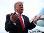 U.S. President Donald Trump speaks to reporters upon his return to Washington at Joint Base Andrews in Maryland, U.S., November 9, 2025.  REUTERS/Kevin Lamarque