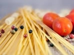 Thirteen major Italian pasta brands could be removed from US grocery shelves due to potential punitive duties exceeding 107%. 