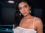 Kylie Jenner's recent poker video at Kris Jenner's 70th birthday has fans speculating about a massive emerald-cut ring on her finger
