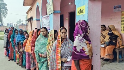 Women voters stand in a queue to cast their votes for the second phase of the Bihar assembly elections, in Katihar on Tuesday. (@CEOBiharX/ANI Photo) (@CEOBiharX) Women voters stand in a queue to cast their votes for the second phase of the Bihar assembly elections, in Katihar on Tuesday. (@CEOBiharX/ANI Photo) (@CEOBiharX)