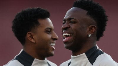 Rodrygo and  Vinicius Junior take part in a training session at the Emirates stadium in London. (AFP)
