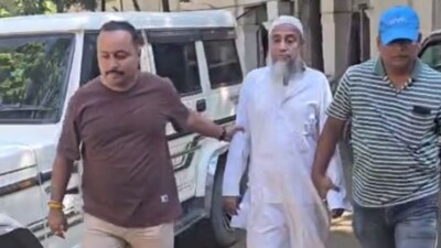 Nazrul Islam Barbhuiyan, a retired school principal, after he was detained in Cachar, Assam, on Tuesday. (Sourced) Nazrul Islam Barbhuiyan, a retired school principal, after he was detained in Cachar, Assam, on Tuesday. (Sourced)