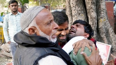 A worker at the LNJP Hospital mortuary, who had completed his early morning shift, described the scenes from the night as "gruesome". (PTI) A worker at the LNJP Hospital mortuary, who had completed his early morning shift, described the scenes from the night as "gruesome". (PTI)