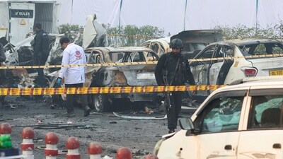The high-intensity explosion ripped through a slow-moving car at a traffic signal near the Red Fort metro station on Monday evening, killing at least nine people and gutting several vehicles. (REUTERS)