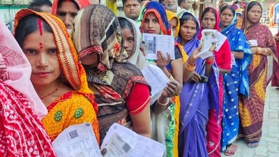 Women voters wait in a queue to cast their vote for the second phase of the Bihar assembly election, in West Champaran on Tuesday. (@CEOBiharX) Women voters wait in a queue to cast their vote for the second phase of the Bihar assembly election, in West Champaran on Tuesday. (@CEOBiharX)
