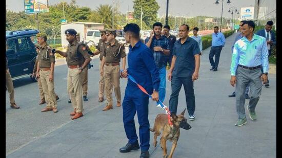 Security personnel conducting a check at a shopping mall in Lucknow on Tuesday. (HT)