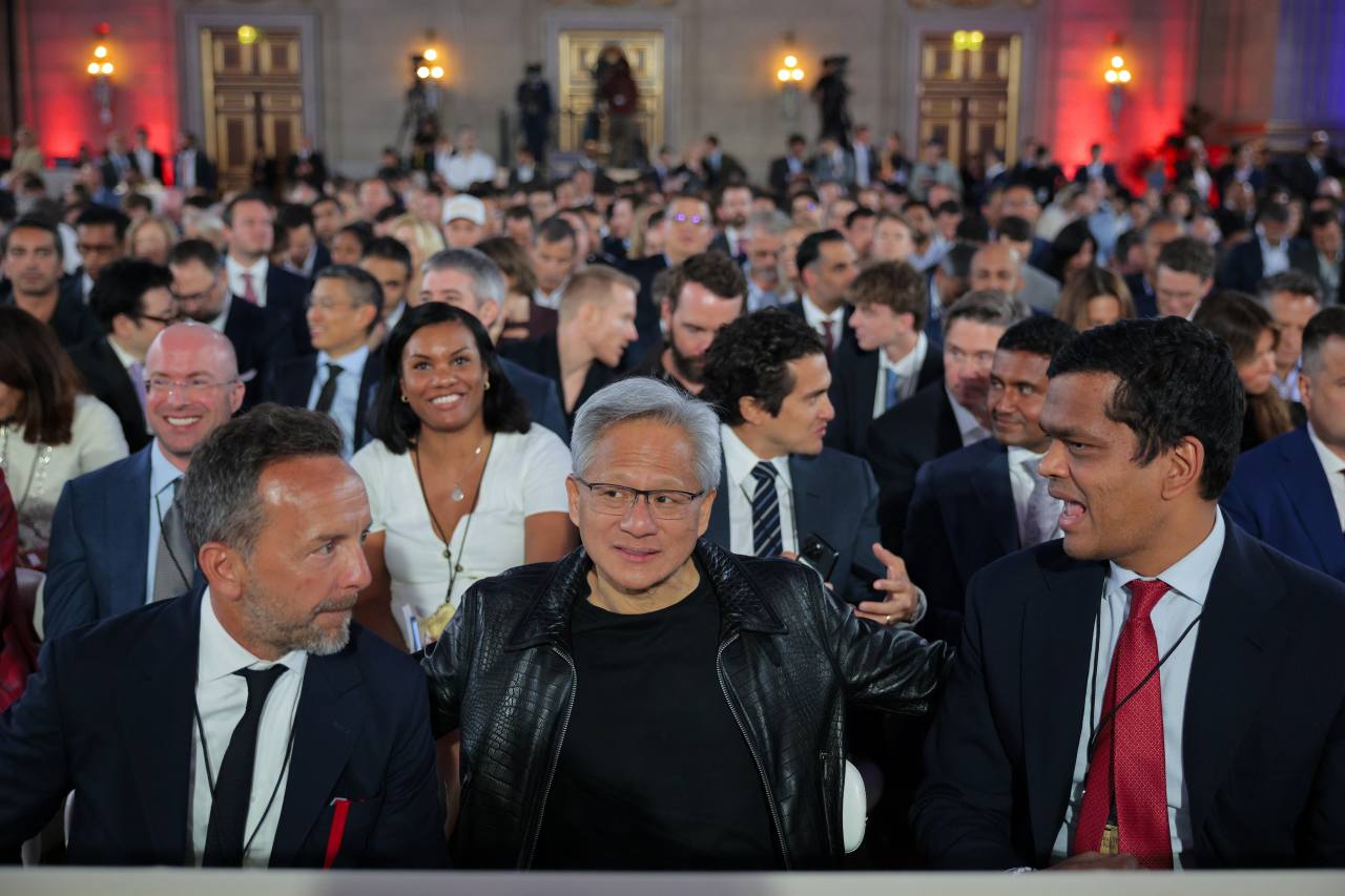 Nvidia CEO Jensen Huang, center, and other tech leaders in the U.S. are helping to push the boundaries of chip technology—a key to American success in AI. Nvidia CEO Jensen Huang, center, and other tech leaders in the U.S. are helping to push the boundaries of chip technology—a key to American success in AI.