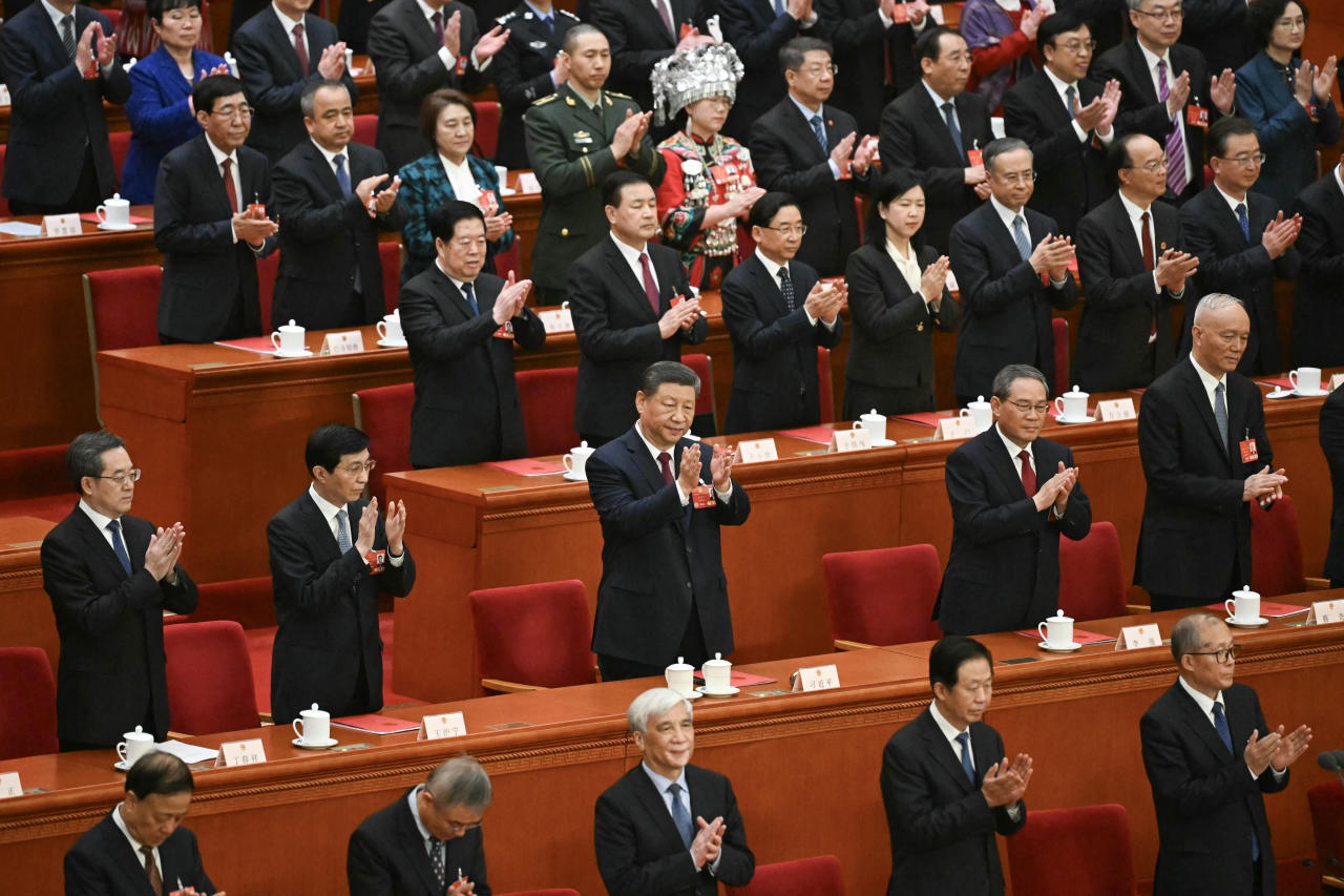 Chinese President Xi Jinping, center, has called for the country to be the world leader in AI by 2030. Chinese President Xi Jinping, center, has called for the country to be the world leader in AI by 2030.