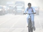 Students going to school in a smoggy and cold morning amid rising levels of air pollution.The Air Quality Index (AQI) rising, Noida recorded an AQI of 406 in the morning, in Noida, India. Students going to school in a smoggy and cold morning amid rising levels of air pollution.The Air Quality Index (AQI) rising, Noida recorded an AQI of 406 in the morning, in Noida, India.